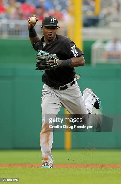 Shortstop Hanley Ramirez of the Florida Marlins throws out a runner against the Washington Nationals at Nationals Park on August 6, 2009 in...