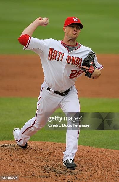 Relief pitcher Logan Kensing of the Washington Nationals delivers against the Florida Marlins at Nationals Park on August 6, 2009 in Washington, DC....