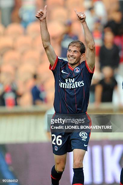 Paris-Saint-Germain's defender Christophe Jallet jubilates after he scored a goal against Lille during the French L1 football match...