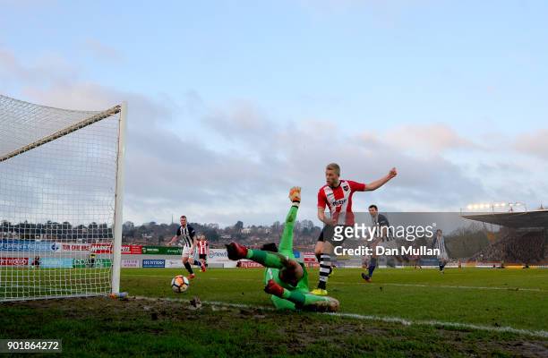 Ben Foster of West Bromwich Albion saves a shot from Jayden Stockley of Exeter City during The Emirates FA Cup Third Round match between Exeter City...