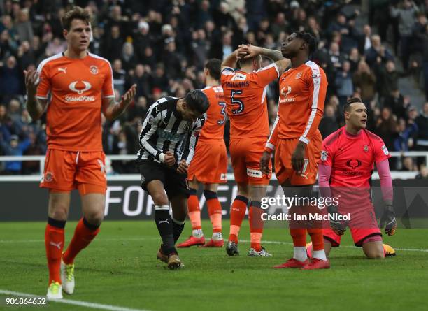 Ayoze Perez of Newcastle United celebrates after scoring the opening goal during the Emirates FA Cup third round match between Newcastle United and...