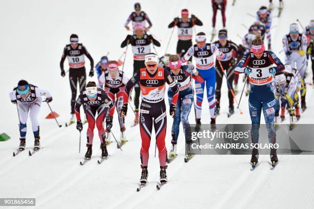 Norway's Ingvild Flugstad Oestberg competes in the Women's Cross Country 10 km Mass Start Classic race of the FIS World cup Tour de Ski at Val Di...