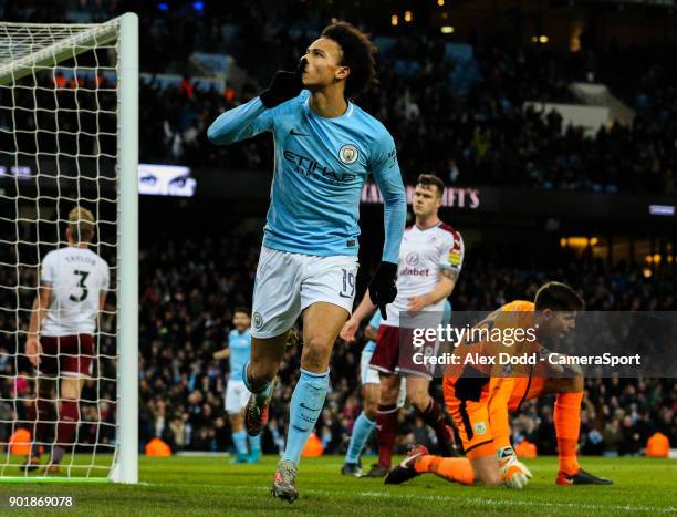 Manchester City's Leroy Sane celebrates scoring his side's third goal during the Emirates FA Cup Third Round match between Manchester City and...