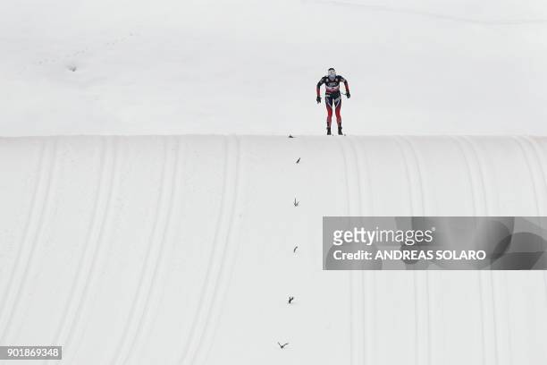 Norway's Heidi Weng competes on January 6, 2018 during the Women's Cross Country 10 km Mass Start Classic race of the FIS World cup Tour de Ski at...