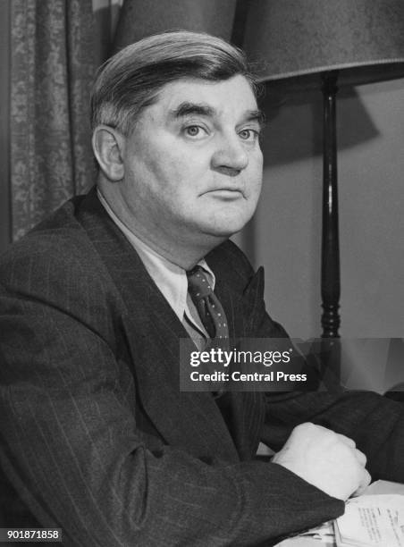 Welsh politician Aneurin Bevan , the Minister of Labour and National Service, at his desk at the Ministry of Labour in London, March 1951.