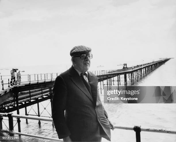 English Poet Laureate John Betjeman , President of the National Piers Society, joins the fight to save Southend Pier , which is threatened with...