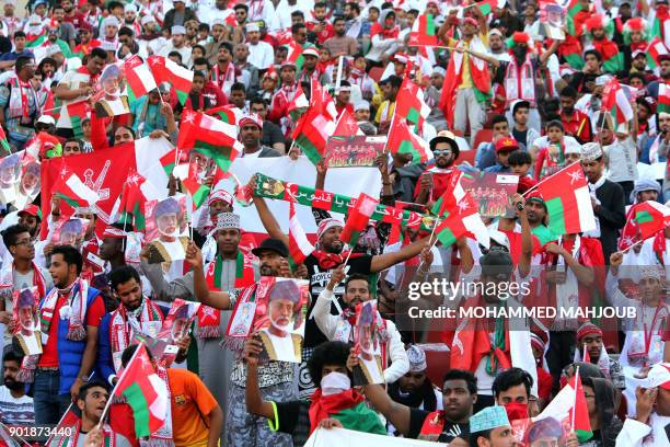 Omani fans attend a celebration ceremony to welcome their national football team after they won the 23th Gulf Cup of Nations, in Muscat on January 6,...