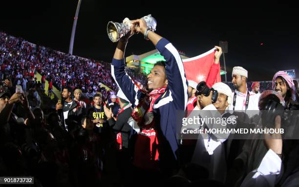 Omani fans and players attend a celebration ceremony to welcome Oman's national football team after they won the 23th Gulf Cup of Nations, in Muscat...