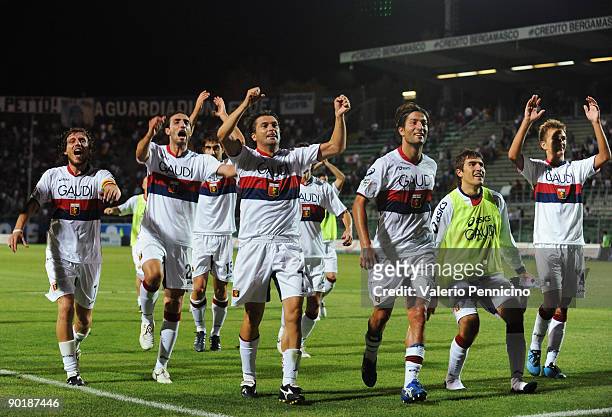 The Genoa CFC team celebrate victory during the Serie A match between Atalanta BC and Genoa CFC at Stadio Atleti Azzurri d'Italia on August 30, 2009...
