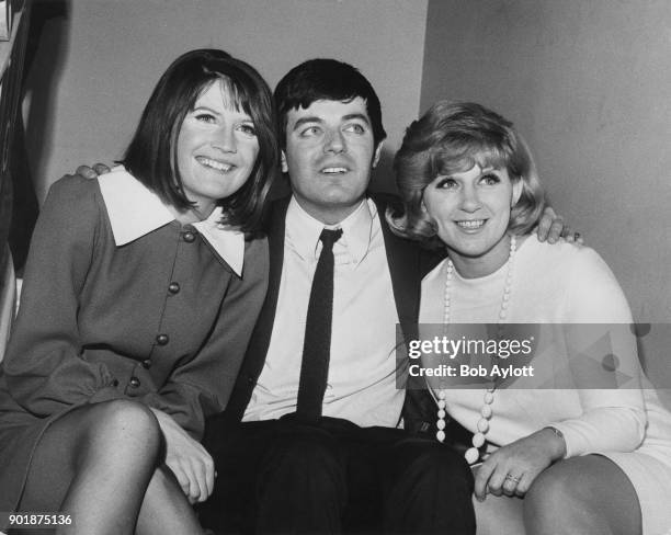 English disc jockey Tony Blackburn with singers Sandie Shaw and Jackie Trent , during a press reception at the Waldorf Hotel in London, 3rd January...
