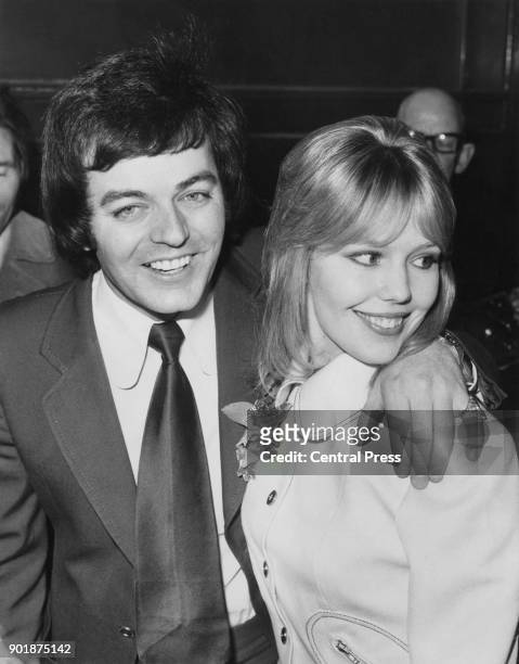 English disc jockey Tony Blackburn with his partner, actress Tessa Wyatt, 2nd March 1972.