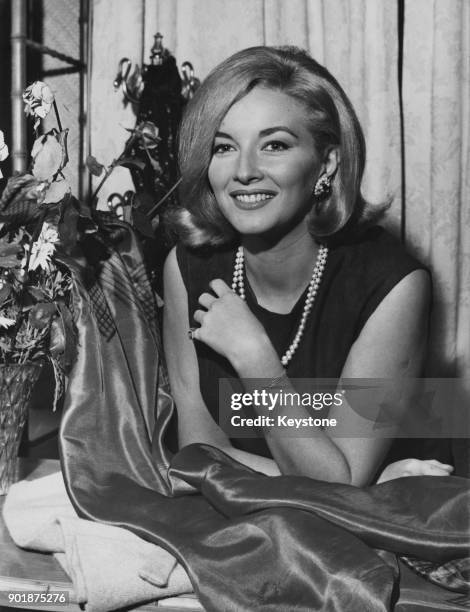 Italian actress Daniela Bianchi, star of the James Bond film 'From Russia With Love', visits a boutique in Rome, Italy, 27th November 1963.