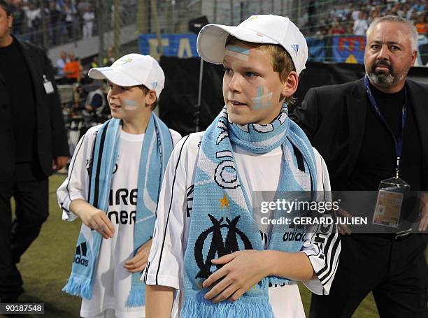 Kyrill and Maurice are pictured during the tribute payed to their father, the former owner of the Marseille football club, Robert Louis-Dreyfus, who...