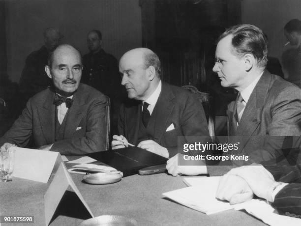 From left to right, Francis Biddle of the USA, Lord Justice Geoffrey Lawrence of the UK and Major General Iona Nikitchenko of the Soviet Union at the...