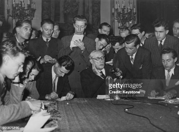 French Prime Minister Léon Blum holds his first press conference after his election in Paris, France, 16th December 1946.