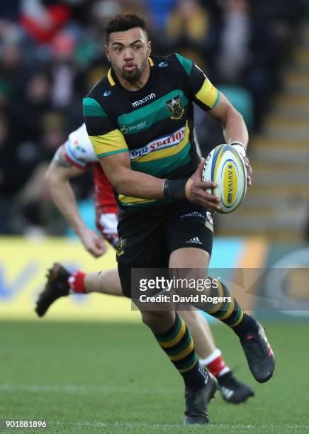 Luther Burrell of Northampton breaks with the ball during the Aviva Premiership match between Northampton Saints and Gloucester Rugby at Franklin's...