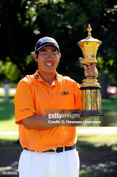 Byeong-Hun An poses with the trophy after winning the Finals of the U.S. Amateur Golf Championship on August 30, 2009 at Southern Hills Country Club...
