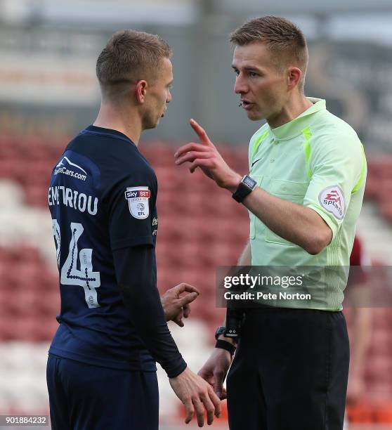 Referee Michael Salisbury makes a point to Jason Demetriou of Southend United during the Sky Bet League One match between Northampton Town and...