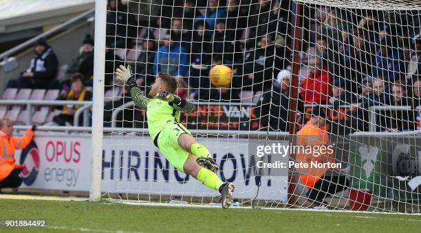 Mark Oxley of Southend United dives in vain as he is beaten by a penalty taken by Matt Grimes of Northampton Town for his sides second goal during...