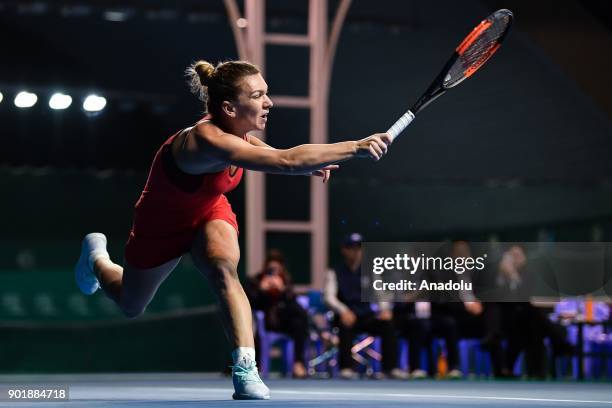 Simona Halep of Romania in action against Katerina Siniakova of Czech Republic during 2018 WTA Shenzhen Open single finals at Longgang International...