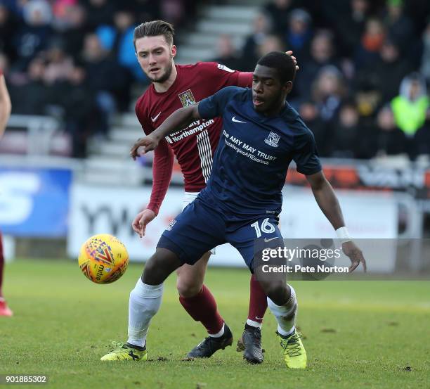 Dru Yearwood of Southend United looks to the ball with Matt Grimes of Northampton Town during the Sky Bet League One match between Northampton Town...