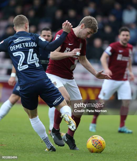 Sam Foley of Northampton Town attempts to control the ball under pressure from Jason Demetriou of Southend United during the Sky Bet League One match...