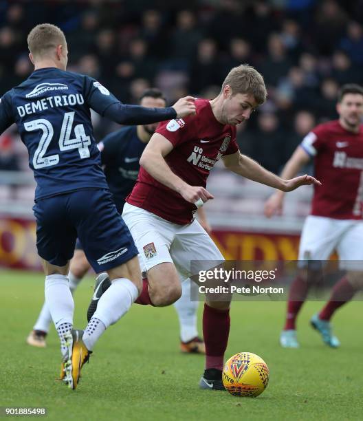 Sam Foley of Northampton Town attempts to control the ball under pressure from Jason Demetriou of Southend United during the Sky Bet League One match...