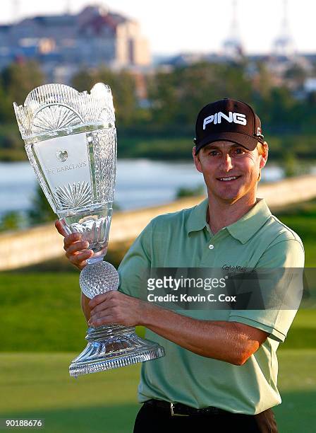 Heath Slocum poses with the championship trophy after winning The Barclays on August 30, 2009 at Liberty National in Jersey City, New Jersey.