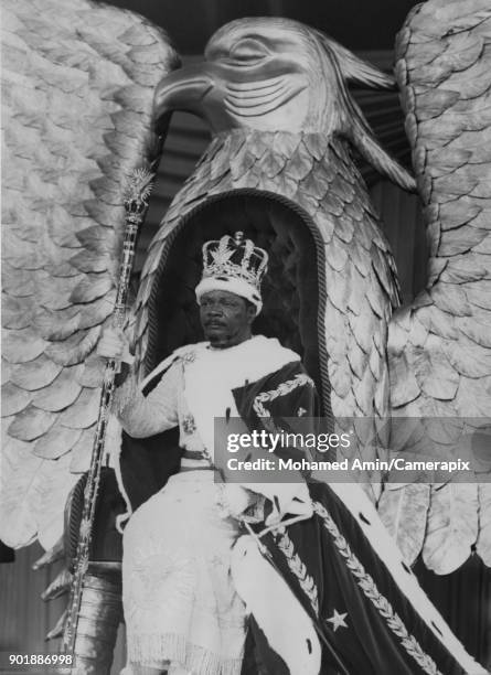 Jean-Bédel Bokassa , the Emperor of Central Africa, seated on a solid gold throne in the shape of an eagle during his coronation, 4th December 1977.
