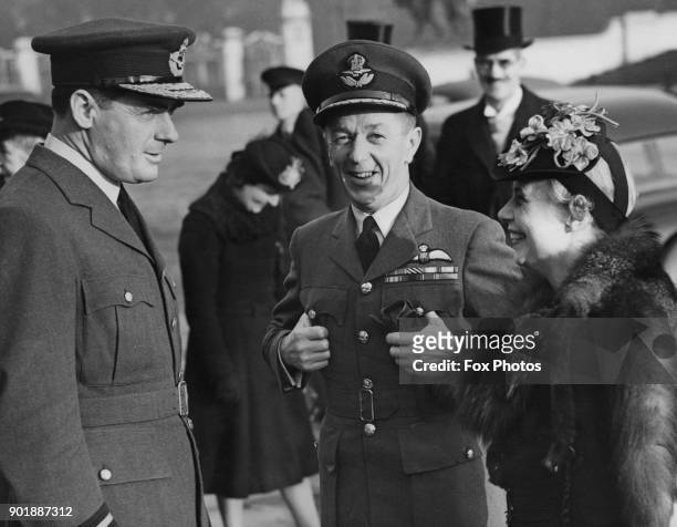 From left to right, Air Commodore Roderick Carr , Group Captain Cecil Bouchier, CBE, DFC, , aka 'Boy', of the RAF, and Bouchier's wife, writer...