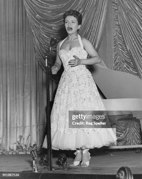 Singer Eve Boswell rehearsing at the London Coliseum for the Royal Variety Performance of 'Guys and Dolls', 2nd November 1953.