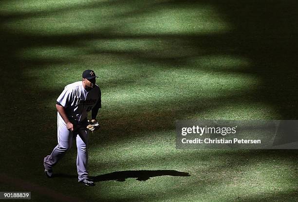 Outfielder Carlos Lee of the Houston Astros in action during the major league baseball game against the Arizona Diamondbacks at Chase Field on August...