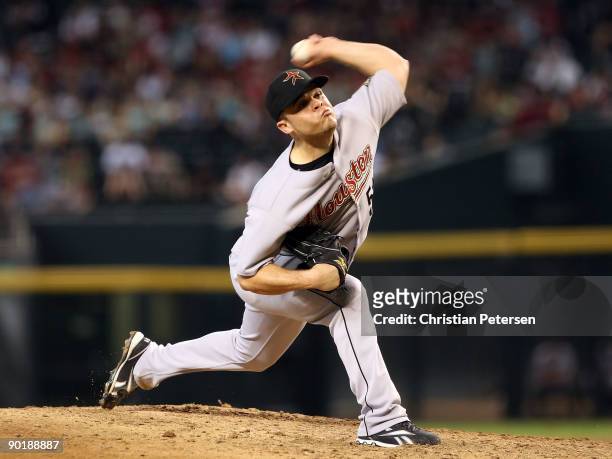 Starting pitcher Wandy Rodriguez of the Houston Astros pitches against the Arizona Diamondbacks during the major league baseball game at Chase Field...