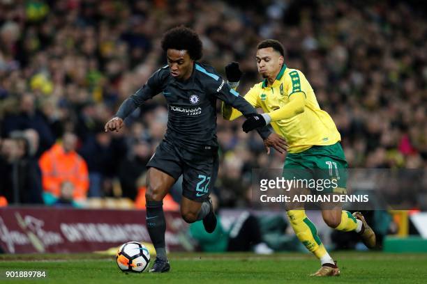 Norwich City's English midfielder Josh Murphy challenges Chelsea's Brazilian midfielder Willian during the English FA Cup third round football match...
