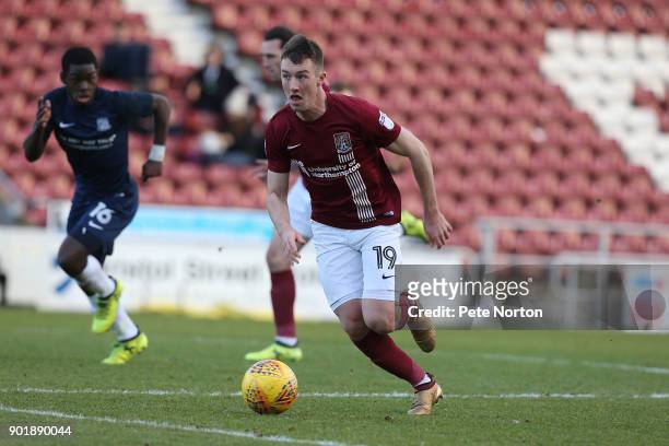 Chris Long of Northampton Town moves forward with the ball during the Sky Bet League One match between Northampton Town and Southend United at...