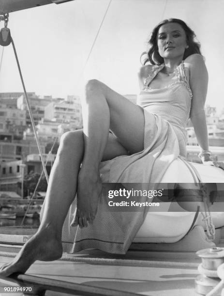 Actress Barbara Bouchet on board a yacht in Athens, Greece, where she is filming 'To Agistri' , circa 1976.