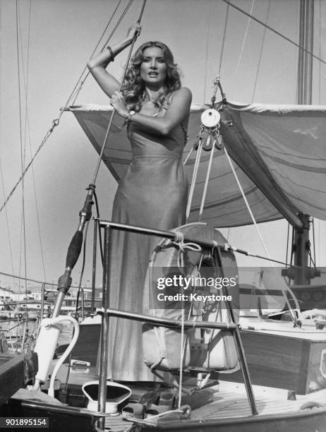 Actress Barbara Bouchet on board a yacht in Athens, Greece, where she is filming 'To Agistri' , circa 1976.