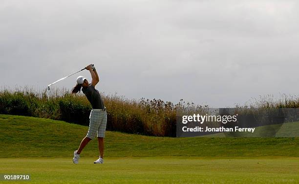 Michelle Wie hitds her second shot on the 9th hole during the final round of the Safeway Classic on August 30, 2009 on the Ghost Creek course at...