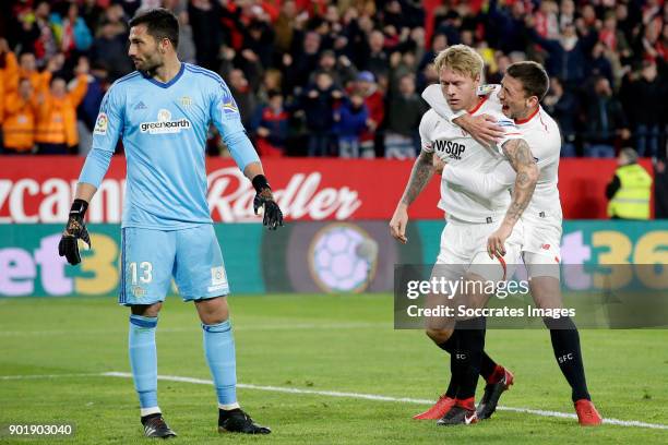 Simon Kjaer of Sevilla FC celebrates 2-2 with Sebastien Corchia of Sevilla FC during the La Liga Santander match between Sevilla v Real Betis Sevilla...