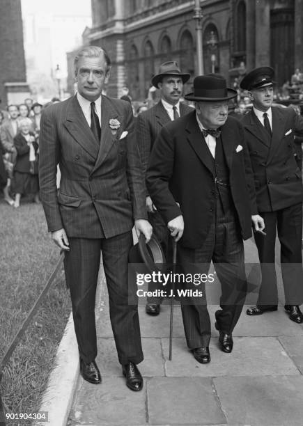 British statesmen Winston Churchill and Anthony Eden arrive at 10 Downing Street in London to discuss the Opposition's demands for an early recall of...