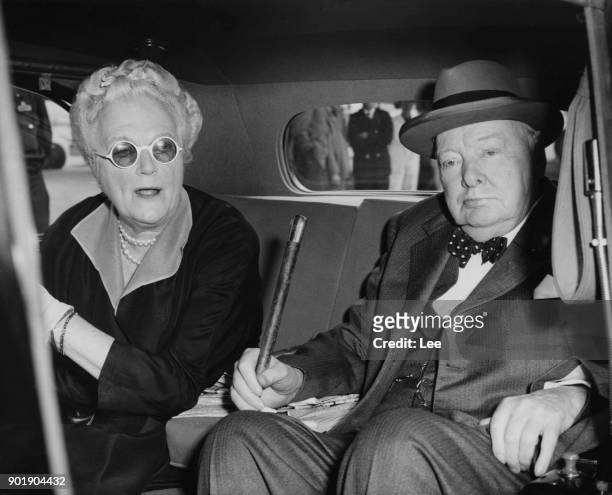 Former British Prime Minister Winston Churchill is met by his wife Clementine at London Airport, after a visit to the United States, 11th May 1959....