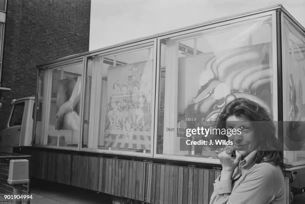 Gallery owner Iris Clert with her perspex gallery-on-wheels at the 1973 Southwark Summer Fair on Bankside, London, 12th June 1973. She drove the...