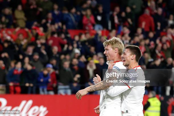 Simon Kjaer of Sevilla FC celebrates 2-2 with Sebastien Corchia of Sevilla FC during the La Liga Santander match between Sevilla v Real Betis Sevilla...