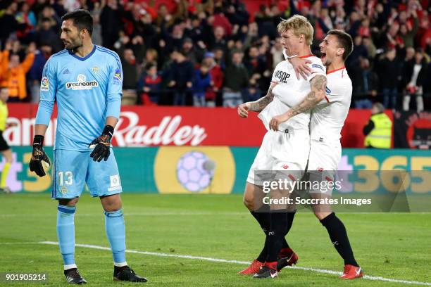 Simon Kjaer of Sevilla FC celebrates 2-2 with Sebastien Corchia of Sevilla FC during the La Liga Santander match between Sevilla v Real Betis Sevilla...