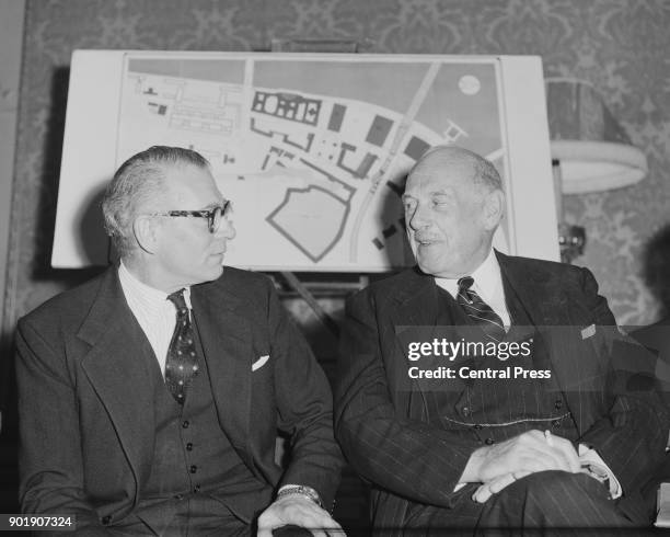 British actor Sir Laurence Olivier and Oliver Lyttelton, 1st Viscount Chandos , representatives of the South Bank Theatre and Opera House Board,...