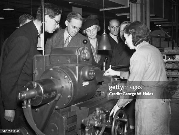 British politician Sir Stafford Cripps and Lady Cripps visit the Hoover Ltd aircraft factory in Greenford, UK, 5th November 1942.