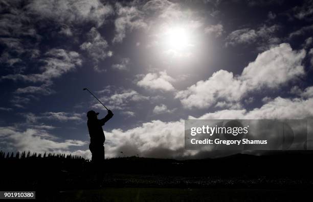 Jason Dufner of the United States plays his shot from the second tee during the third round of the Sentry Tournament of Champions at Plantation...
