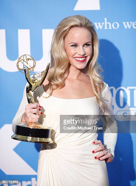 Julie Berman, winner of the Emmy for Outstanding Younger Actress in a Drama Series, poses in the press room at the 36th Annual Daytime Emmy Awards at...