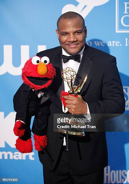 Kevin Clash, winner of the Emmy for Outstanding Performer in a Children's Series, poses in the press room at the 36th Annual Daytime Emmy Awards at...