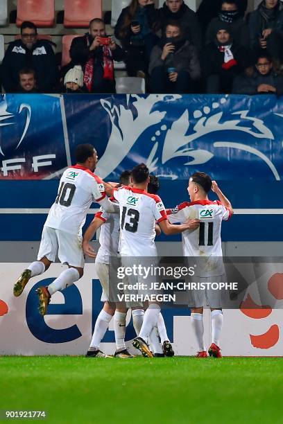 Nancy's players celebrate after scoring a penalty during the French Cup football match between Nancy and Lyon on January 6, 2018 at Marcel Picot...